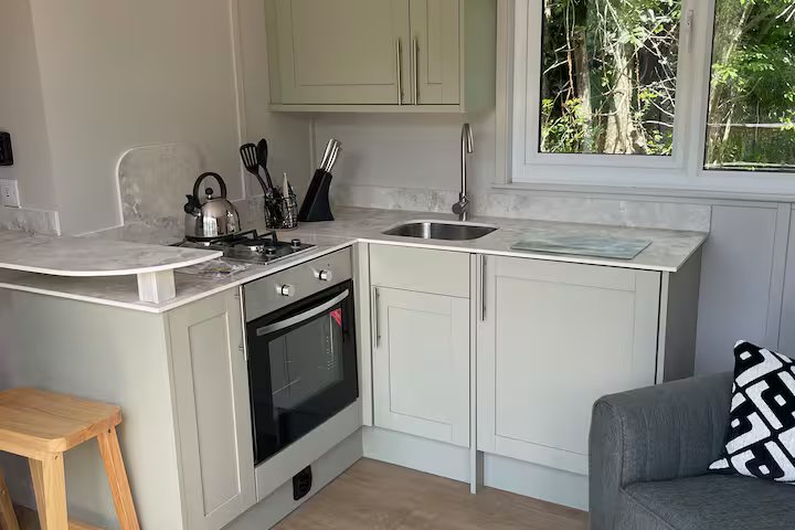 The kitchen area complete with hob and oven.