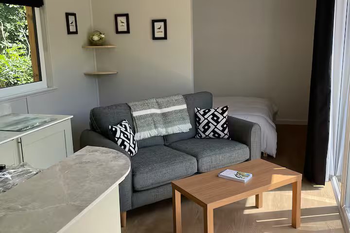 Sofa and cushions inside a pod
